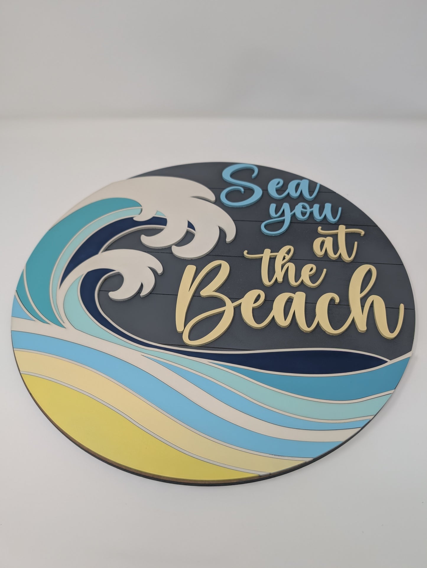 "Sea You at the Beach" Round Wood Sign – Coastal Wall Decor