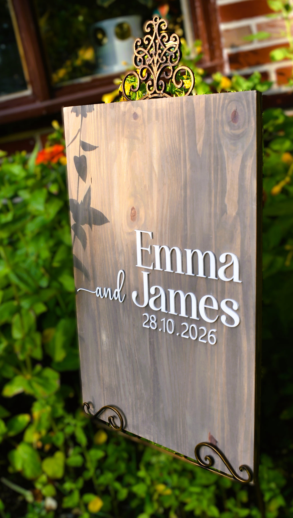 Personalized wooden wedding sign with 'Emma and James 28.10.